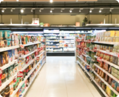 blurred image of grocery store with purecold in the background